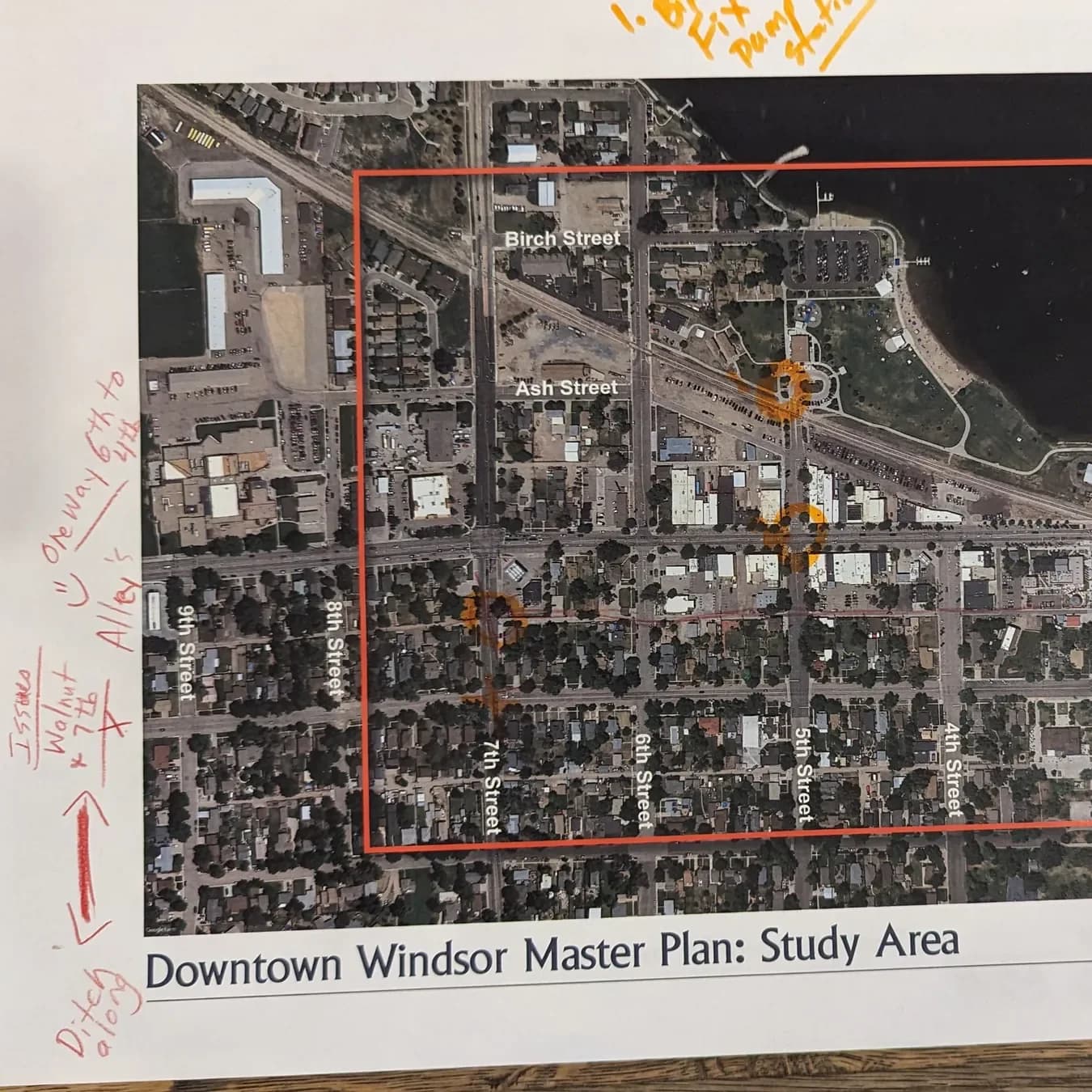 A printed map of the Downtown Windsor Master Plan study area, marked up by hand in red and orange